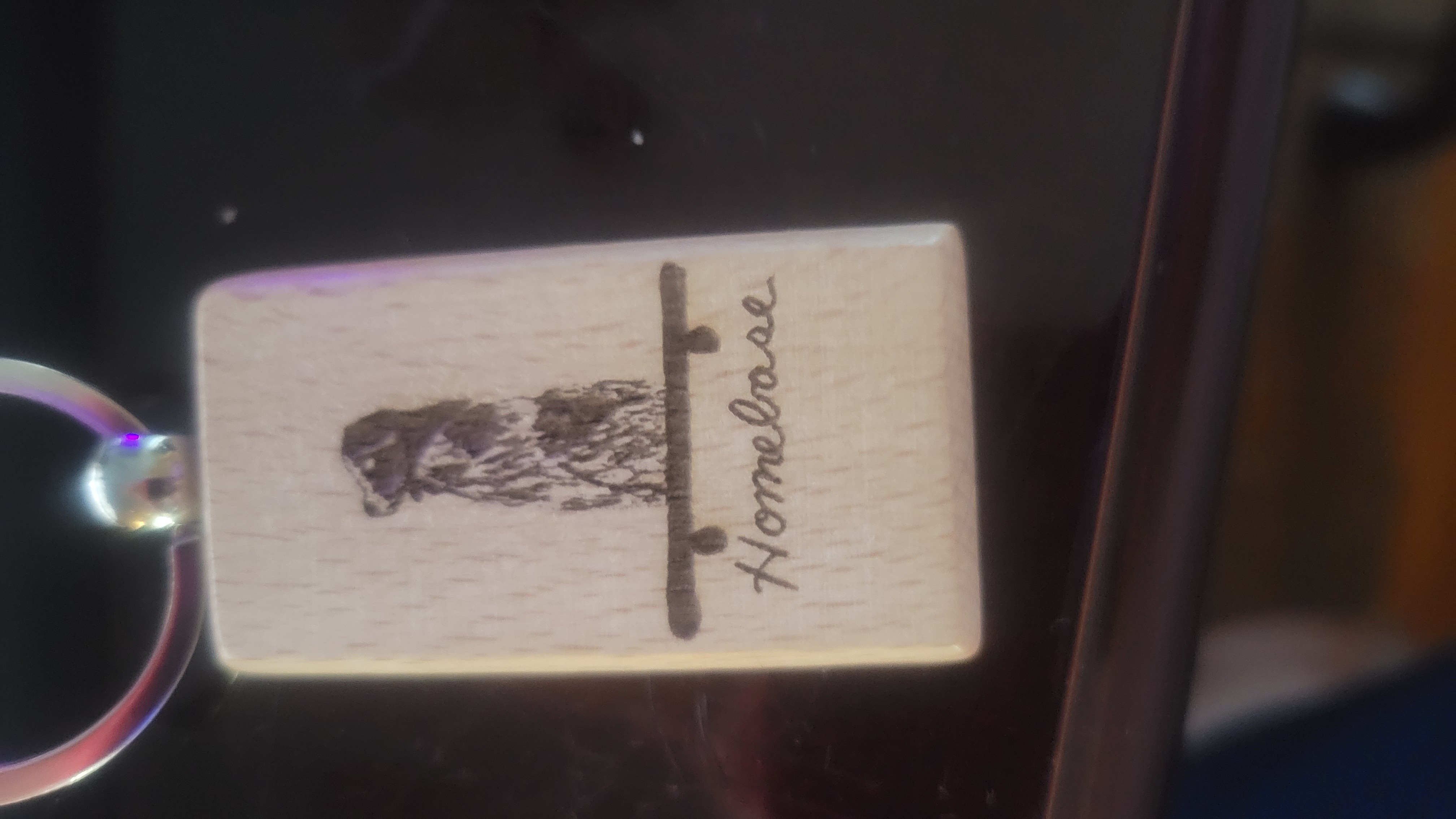 Wooden sign with engraved design